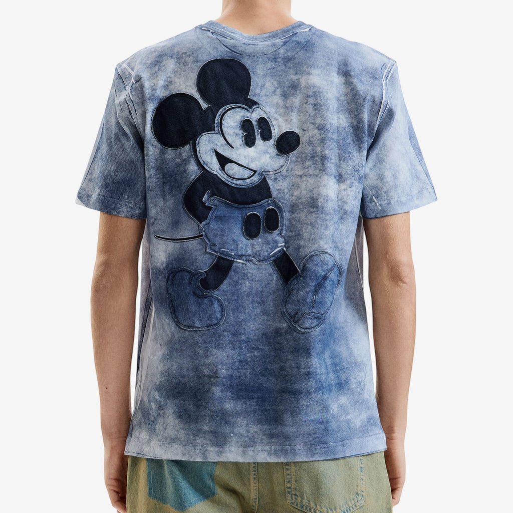 Once Upon Magic blue acid wash t-shirt with a large Mickey Mouse graphic on the back, made of denim patches.