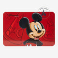 Once Upon Magic red plastic placemat featuring Mickey Mouse in a Fantasia wizard hat design. Disneyland Paris logo.