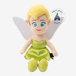 Peluche Clochette Once Upon Magic, robe verte, ailes blanches, cheveux blonds, yeux bleus, souriante, style enfantin.