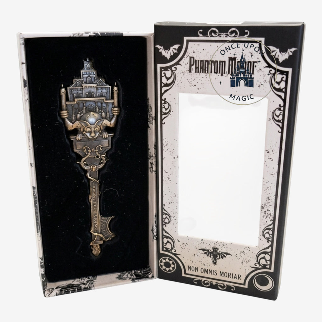 Once Upon Magic Phantom Manor attraction key, gothic metallic design, presented in a decorative box.