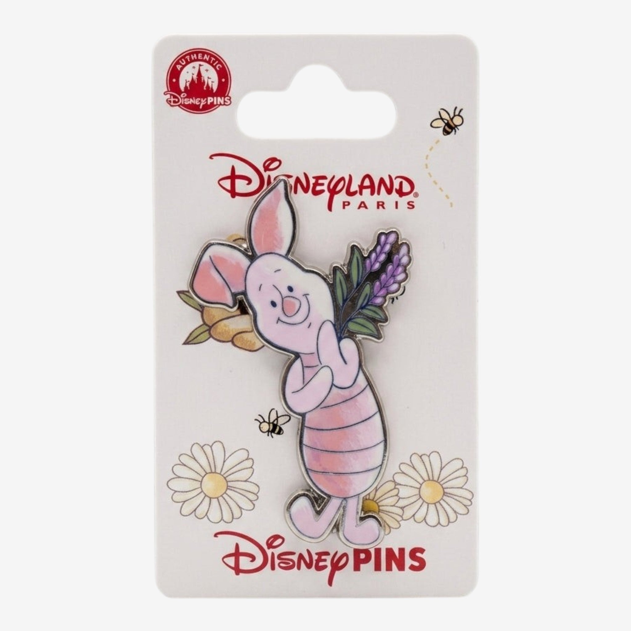 Once Upon Magic's pink enamel Piglet pin from Disneyland Paris, holding lavender. Features classic Winnie the Pooh character design.