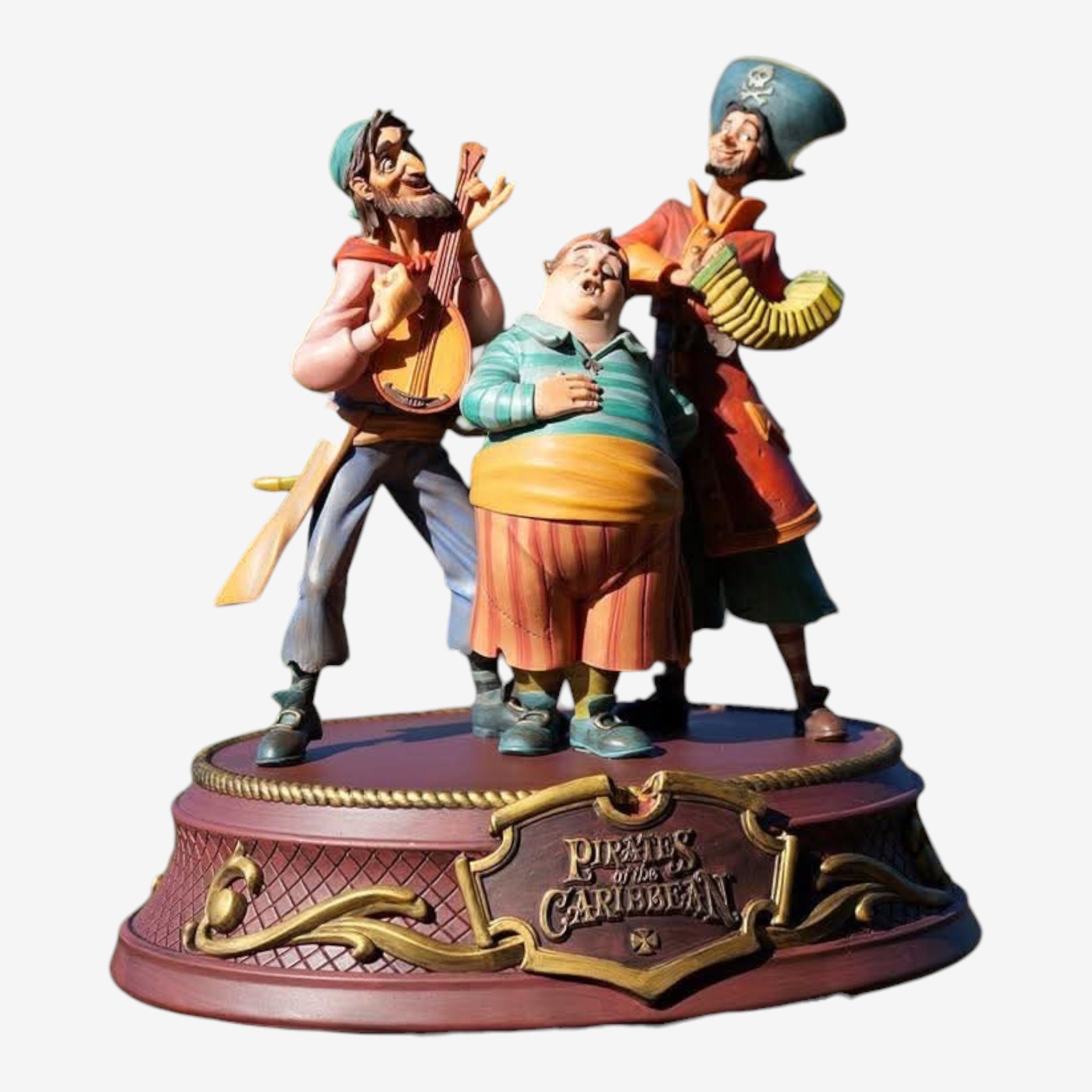 Once Upon Magic's Pirates of the Caribbean figurine by Kevin & Jody, featuring three colorful pirates singing and playing instruments on a decorative base.
