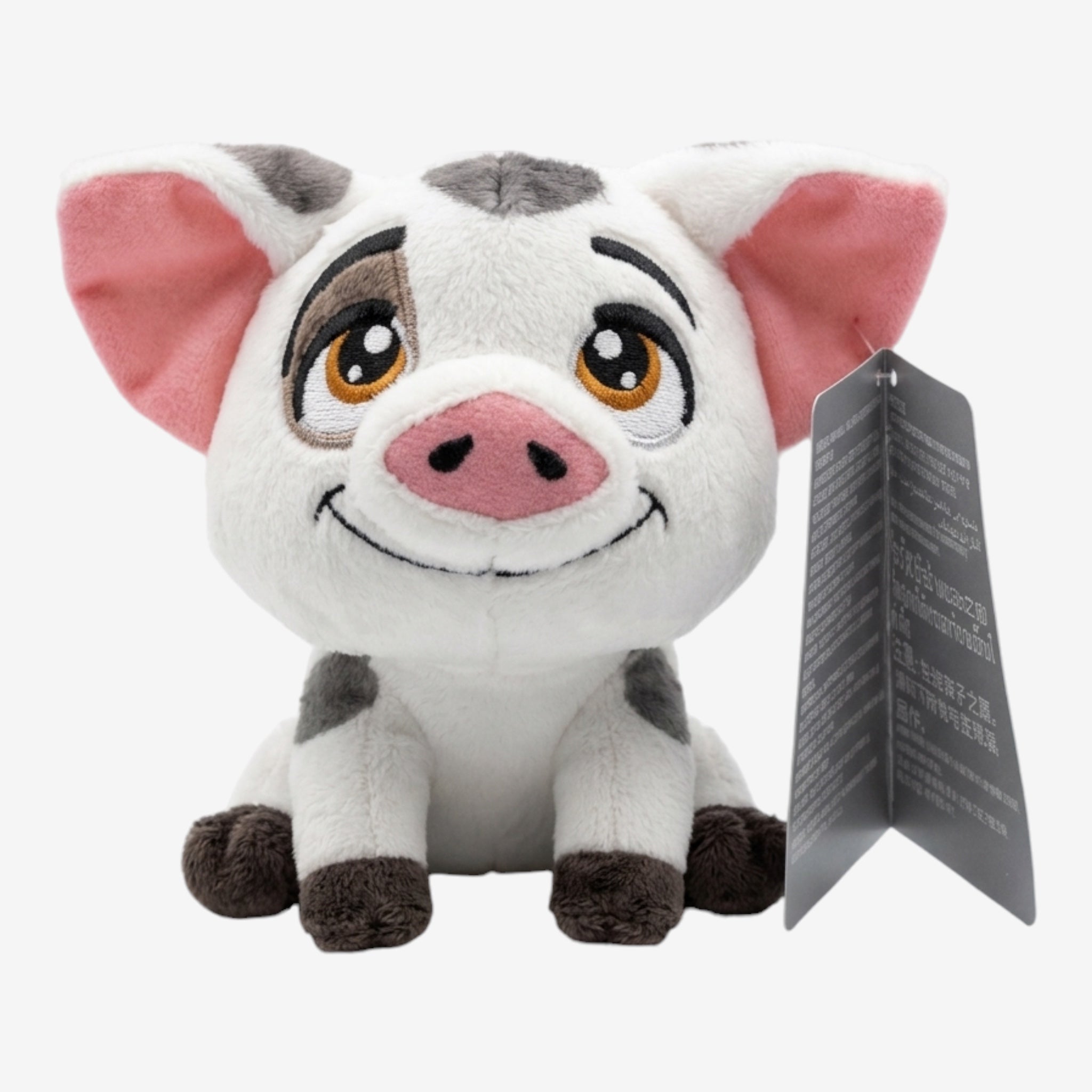 Once Upon Magic Pua plush toy, a white pig with grey spots, pink ears, and a smiling face, inspired by Disney's Moana.