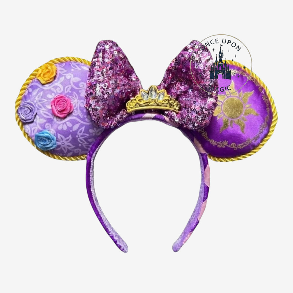 Once Upon Magic purple Minnie ears headband with sequined bow and golden crown, inspired by Rapunzel.