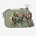 Once Upon Magic green faux leather crossbody bag featuring a Simba illustration with tribal-inspired foliage and a patterned strap.