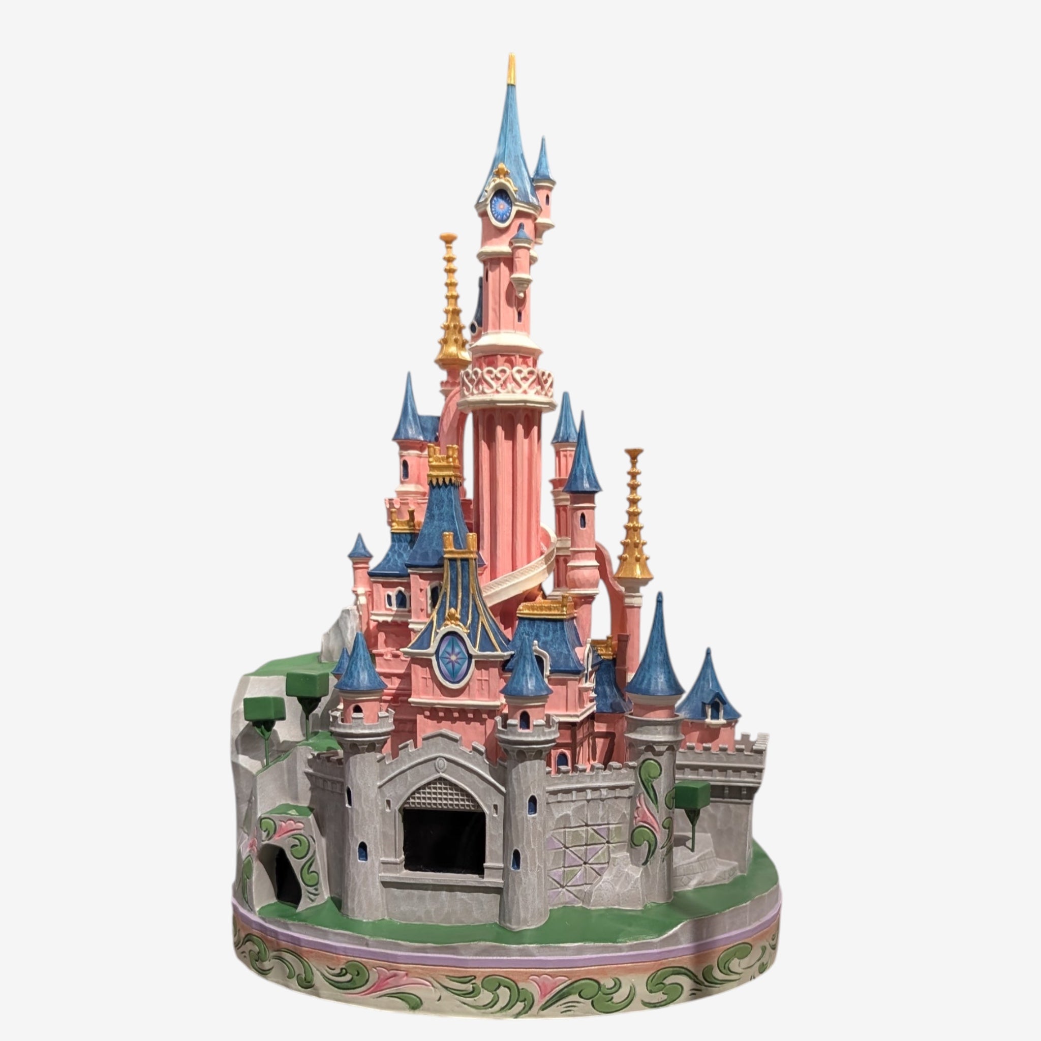 Once Upon Magic Disneyland Paris Sleeping Beauty Castle figurine by Jim Shore. Pink castle with blue roofs and gold accents.