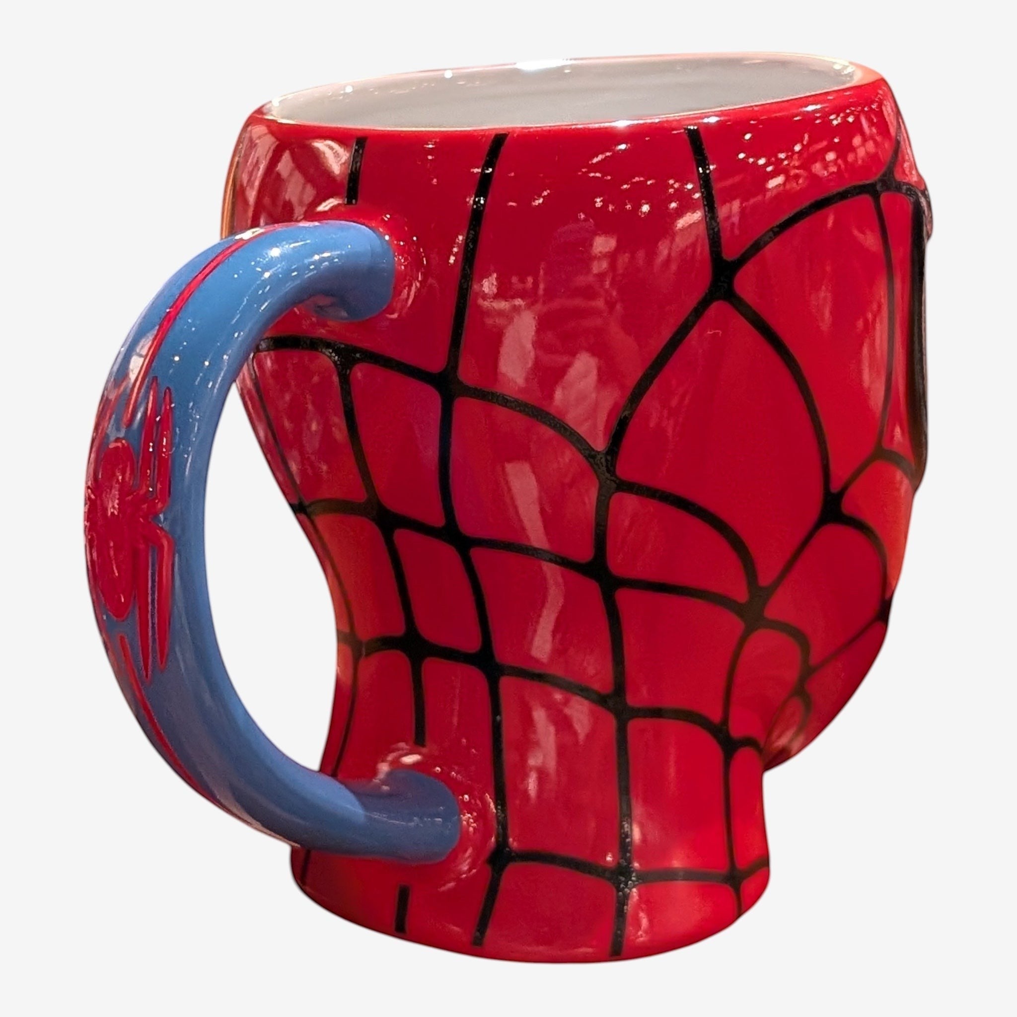 Once Upon Magic Spider-Man 3D mask mug, red with black web design and blue handle with spider emblem.