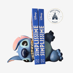 Once Upon Magic Disney Stitch bookend, blue resin, depicting Stitch lying down with a mischievous smile, holding books.
