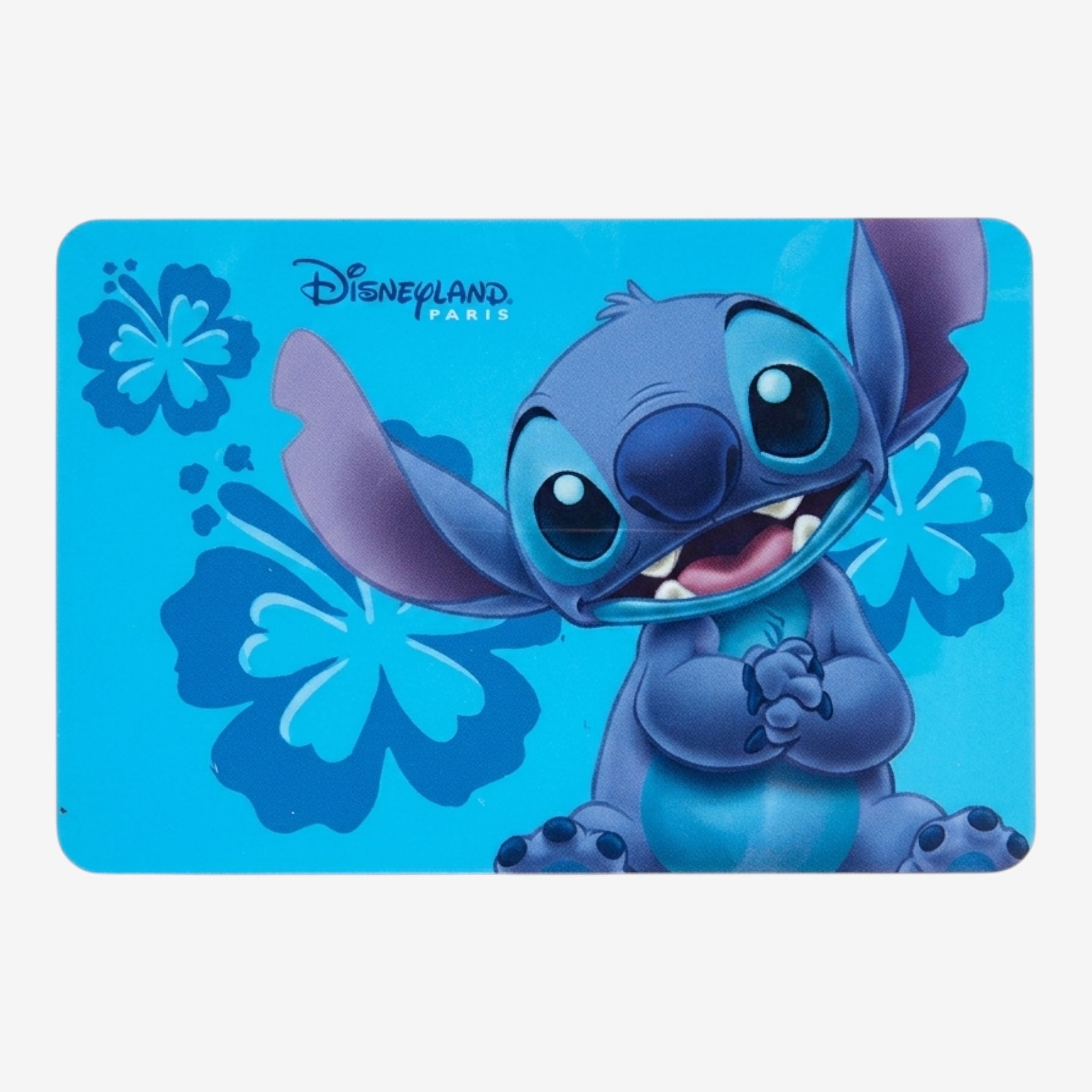 Once Upon Magic Disneyland Paris Lilo & Stitch blue placemat with Stitch and hibiscus flowers. Rigid plastic, easy to clean.