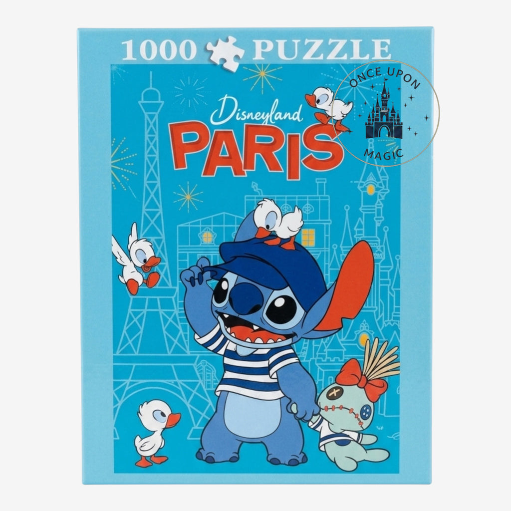 Once Upon Magic Stitch 1000 piece puzzle featuring Stitch in a blue hat and striped shirt with Disneyland Paris landmarks and birds.