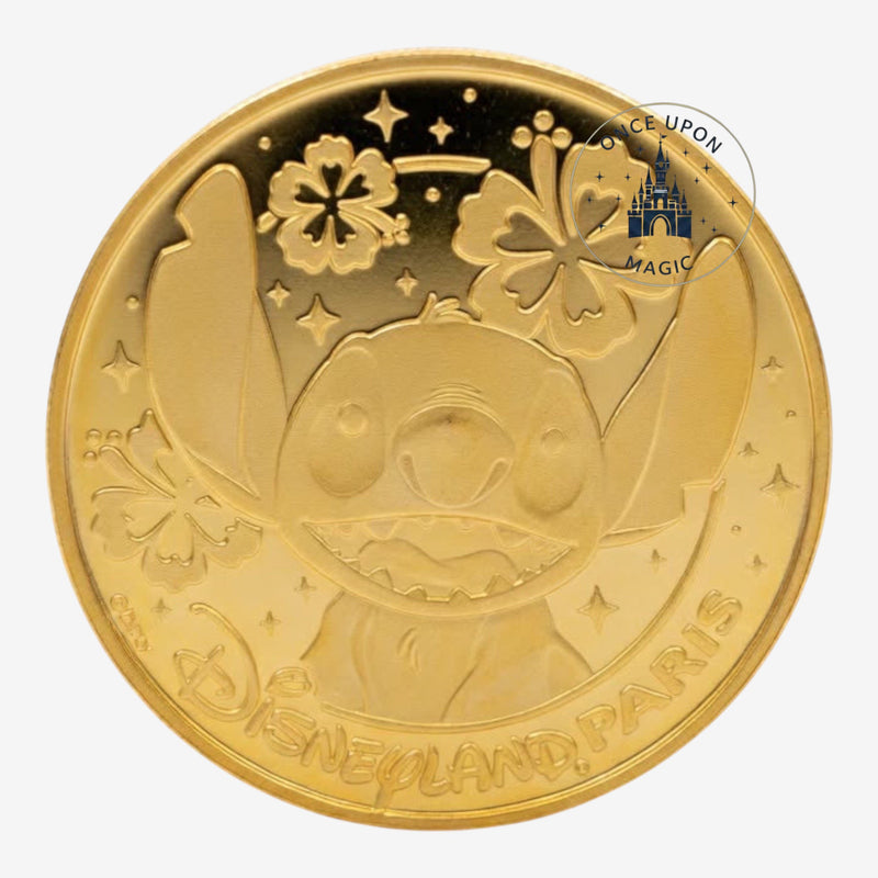 Once Upon Magic gold-tone Stitch coin medal featuring Stitch with flowers and stars, Disneyland Paris inscription.