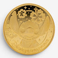 Once Upon Magic gold-tone Stitch coin medal featuring Stitch with flowers and stars, Disneyland Paris inscription.