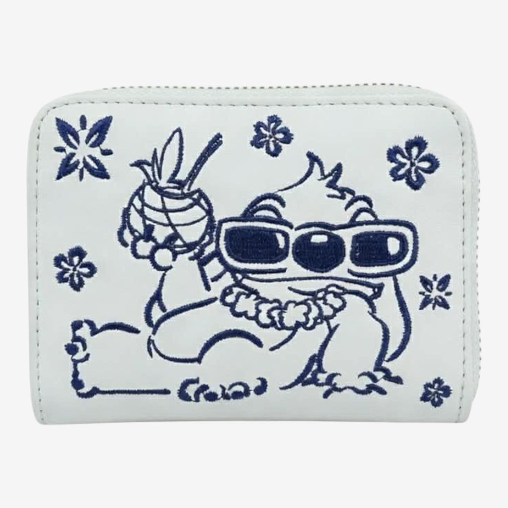 Once Upon Magic white faux leather wallet with blue Stitch embroidery, sunglasses, lei, and tropical flowers.