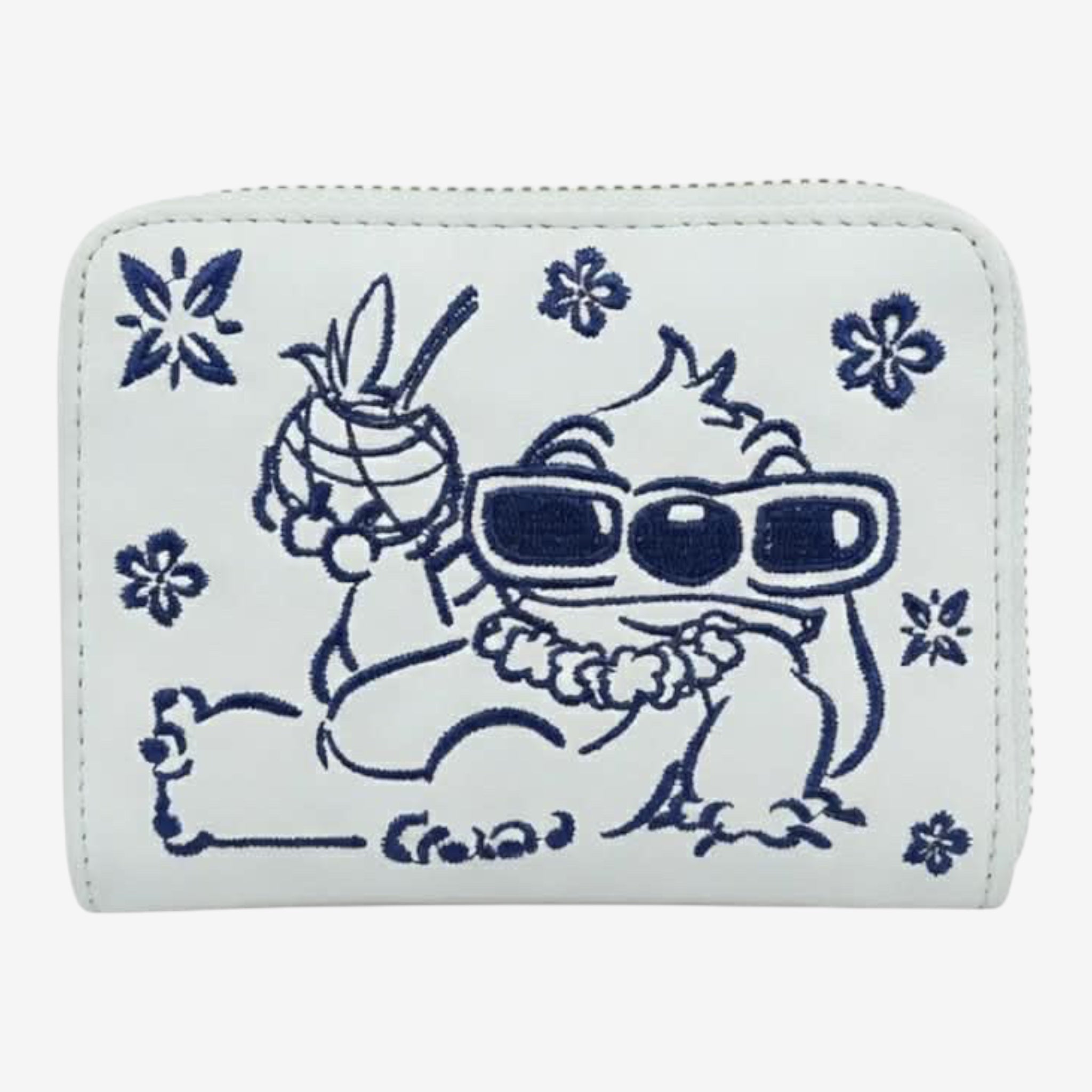 Once Upon Magic white faux leather wallet with blue Stitch embroidery, sunglasses, lei, and tropical flowers.