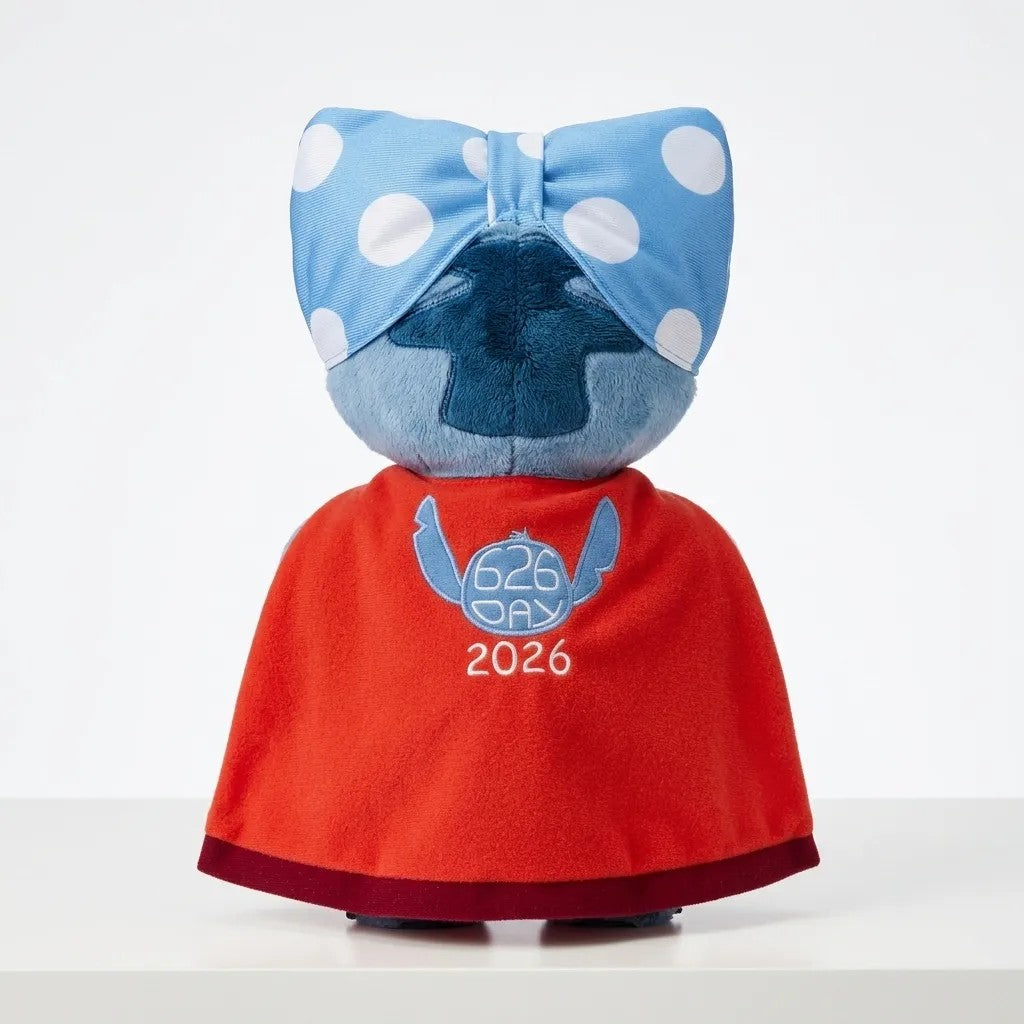 Once Upon Magic Stitch plush toy with blue polka dot bow and red cape embroidered with 626 Day 2026.