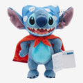 Once Upon Magic blue Stitch plush toy with red cape and blue polka dot bow, soft and huggable.