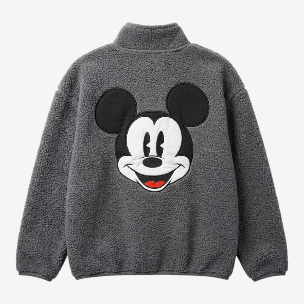 Sweat polaire gris foncé demi-zip avec un grand motif de Mickey Mouse sur le dos et un logo brodé « Est. 1992 » sur l'avant, par Once Upon Magic.