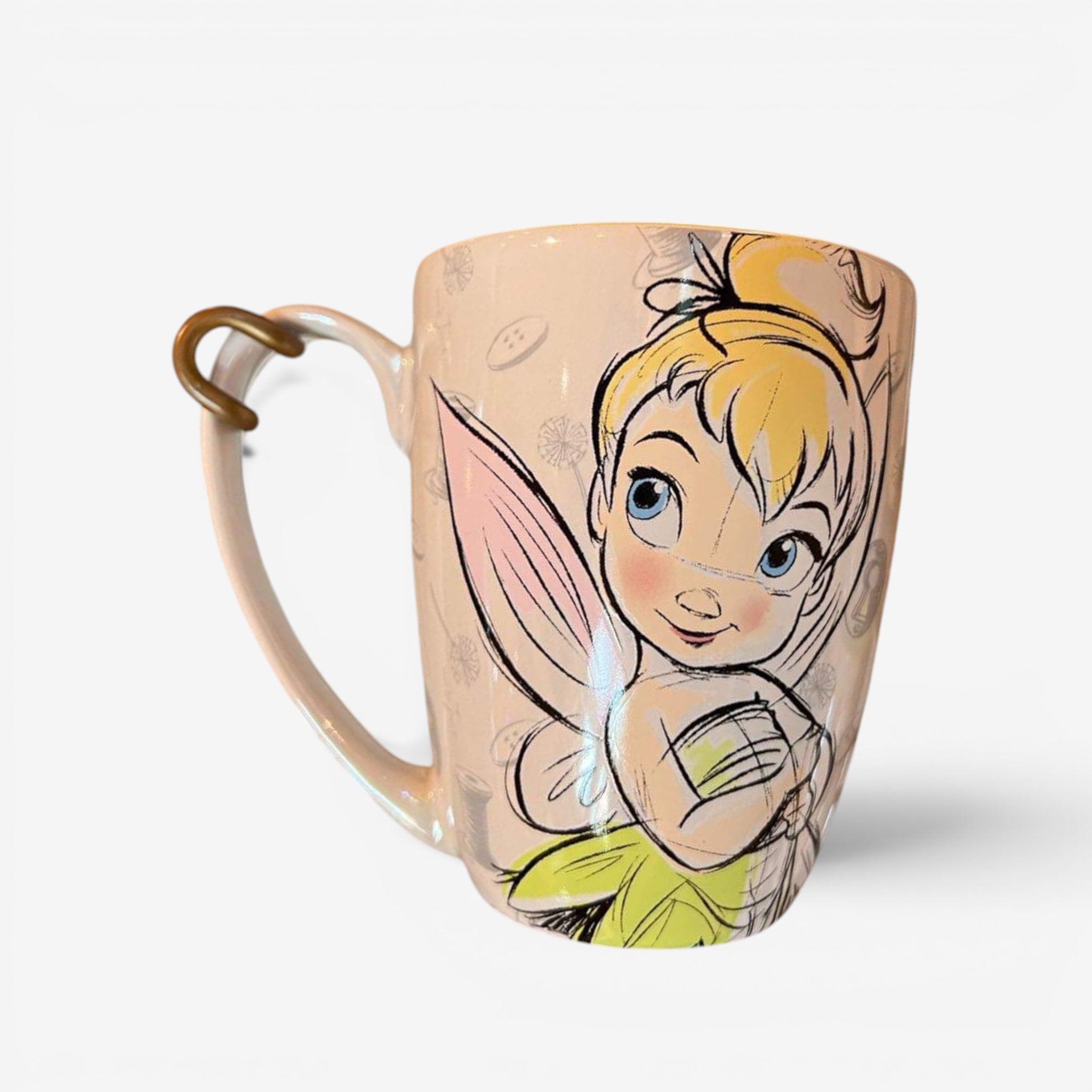 Once Upon Magic Tinker Bell mug with a pastel pink iridescent finish and a sketch-style illustration of the fairy.