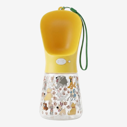 Once Upon Magic yellow portable dog water bottle with built-in dispenser and a fun print of various dog breeds.