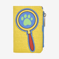 Once Upon Magic Zootopia wallet featuring Nick Wilde & Judy Hopps with a magnifying glass design. Yellow faux leather.