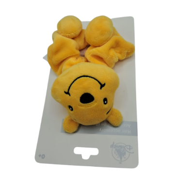 Chouchou peluche Winnie l’Ourson vu de face – Disneyland Paris